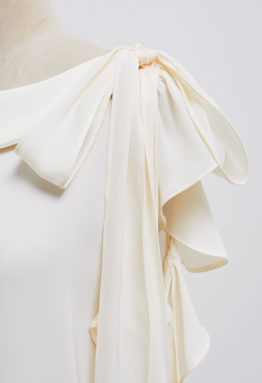 Side Knot Ruffle Sleeveless Satin Top in Cream