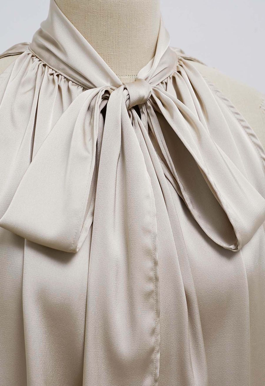 Self-Tie Bowknot Asymmetric Sleeveless Satin Top in Champagne