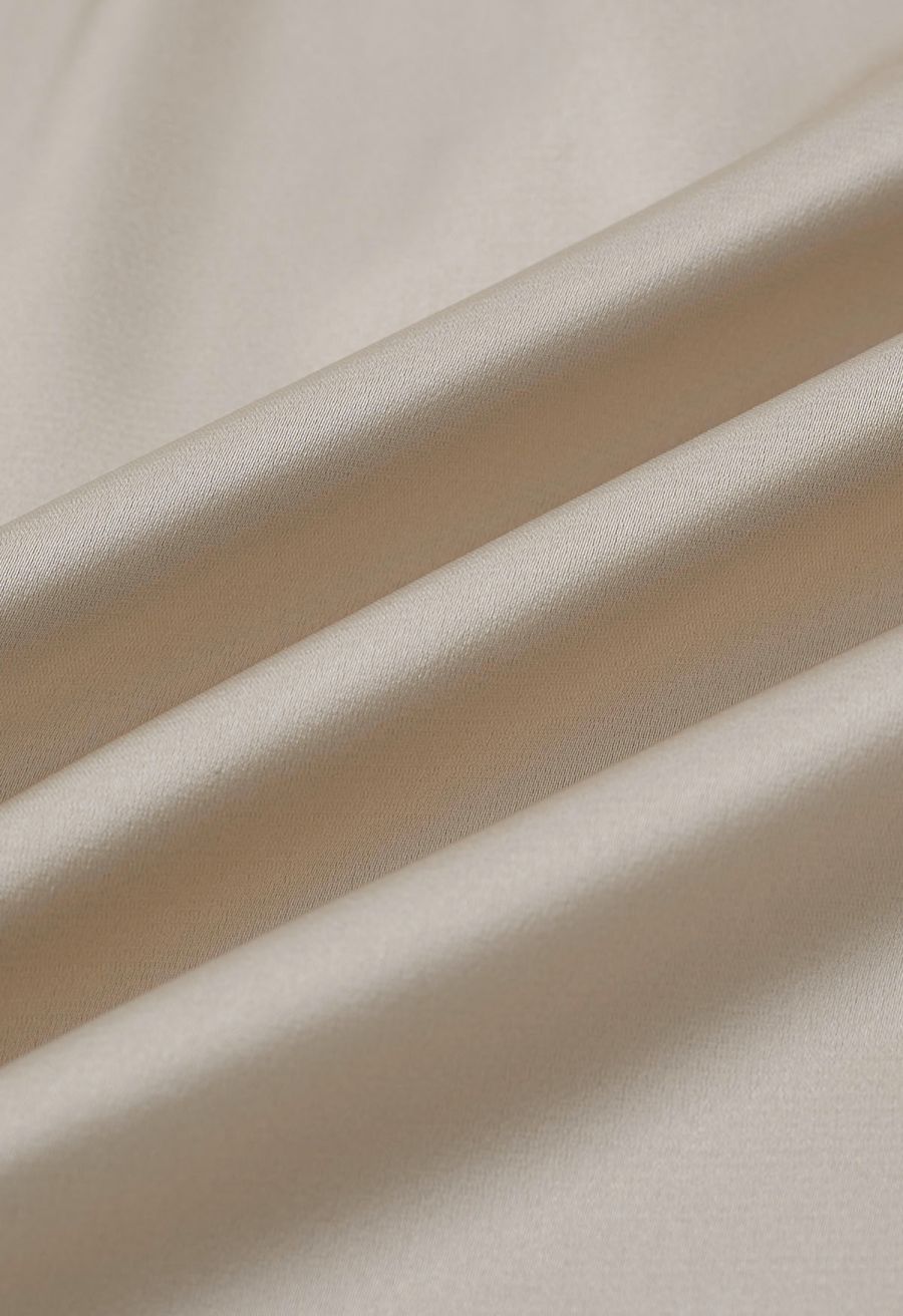 Self-Tie Bowknot Asymmetric Sleeveless Satin Top in Champagne