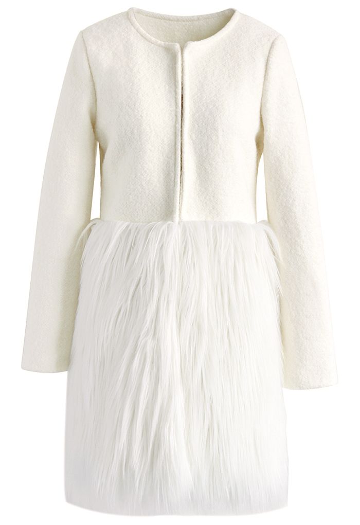 Front view of a chic winter essential faux fur coat on a hanger, featuring a textured white fabric and luxurious fur trim.