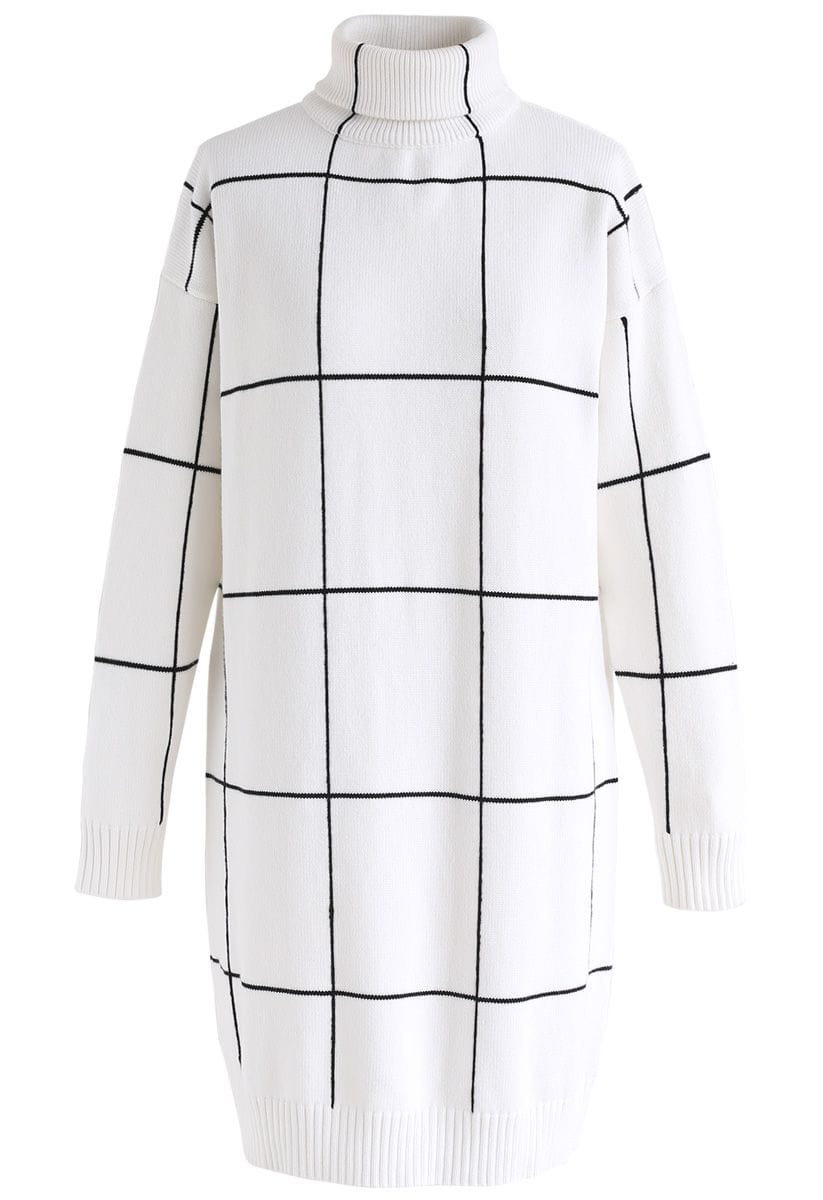 Front view of a white turtleneck sweater dress featuring a black grid pattern, offering a modern and minimalist look.