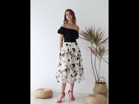Off-Shoulder Tiered Cropped Knit Top in Black