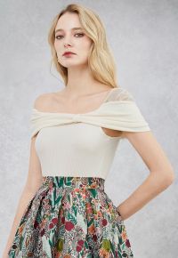 Mesh One-Shoulder Bowknot Ribbed Crop Top in Cream