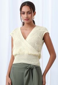 Sequins Tassel Trim Wrap Sleeveless Knit Top in Cream