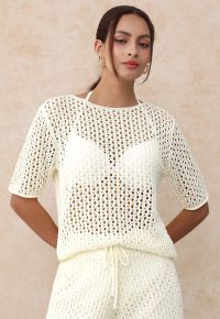 Hollow Out Rolled Edge Knit Top in Ivory