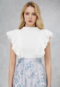 Tiered Ruffle Lace Mock Neck Sleeveless Top in White