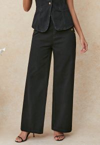 Classic Golden Button Embellished Jeans in Black