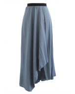 Asymmetric Raw Edge Pleated Skirt in Dusty Blue